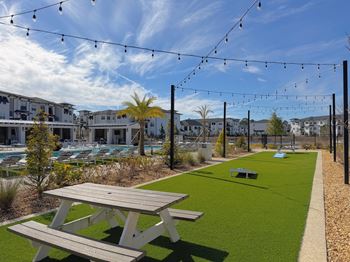Cornhole and bocce ball game area